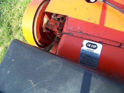 Powerking 2414 tractor with finish mower and implements