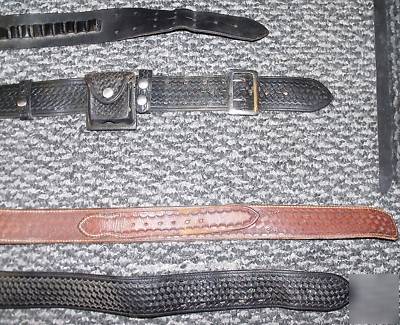 Lot of duty belts , cartridge belts ,bianchi holsters 