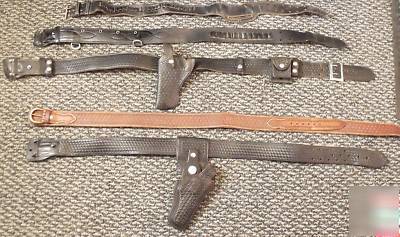 Lot of duty belts , cartridge belts ,bianchi holsters 