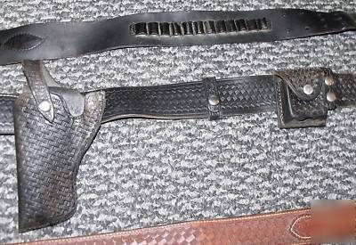 Lot of duty belts , cartridge belts ,bianchi holsters 