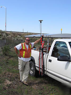Truck rack to carry a gps rod for land surveying