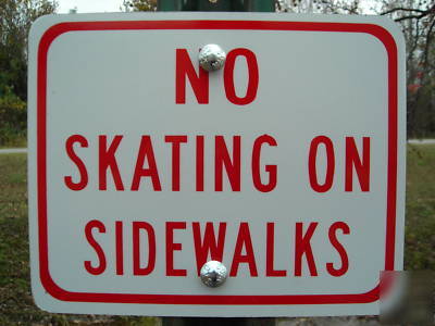 No skating on sidewalks sign