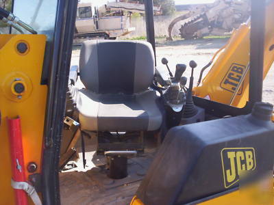 Jcb 1CX high flow backhoe loader w/skid steer atachment