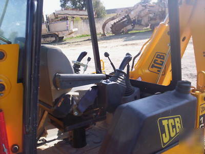 Jcb 1CX high flow backhoe loader w/skid steer atachment