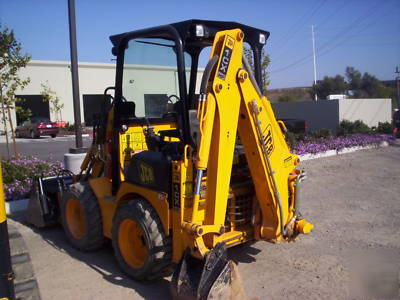 Jcb 1CX high flow backhoe loader w/skid steer atachment