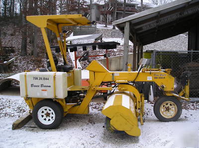 Broce power broom, towable