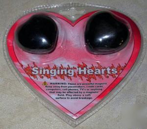 Heart shaped hematite buzz magnets singing hearts