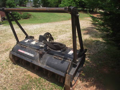 Skid steer mulching attachment