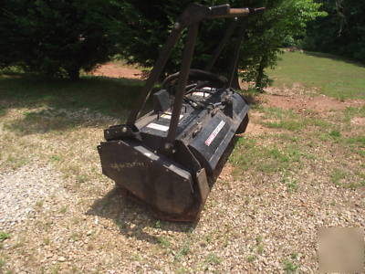 Skid steer mulching attachment