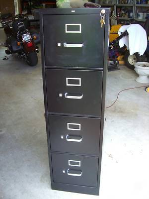 Used steel metal black 4 drawer locking filing cabinet