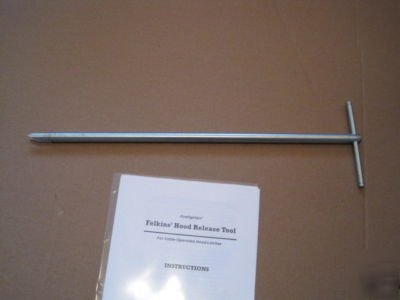 Firefighter's hood release tool - cable operated latch