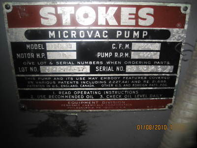 Stokes microvac rotary piston vacuum pump by edwards