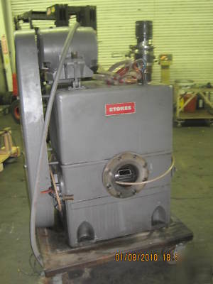 Stokes microvac rotary piston vacuum pump by edwards