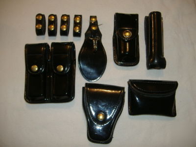 Gloss police gear handcuff stinger oc keepers pouches
