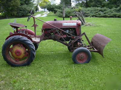 Farmall cub tractor and snow blade