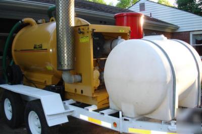 Vactron vacuum excavator ditch witch vermeer excavation