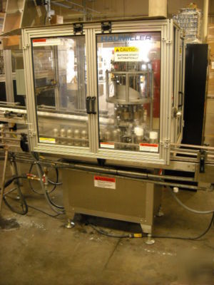 Haumiller spray tip applicator machine
