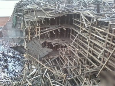 Lumber, large timber, wood beams, dismantling bulding
