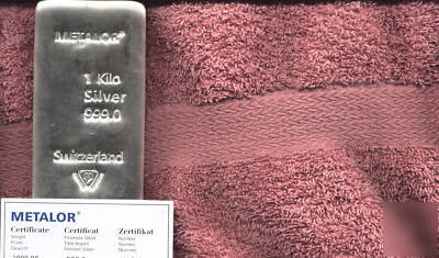 1KG silver bullion bar oz with this land plot purchased