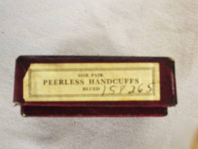 Mint pair of peerless blued police handcuffs & box old
