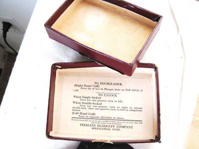 Mint pair of peerless blued police handcuffs & box old