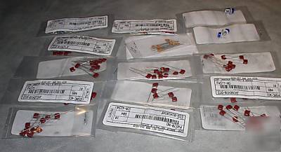 New 100 plus electronic capactors in bag,