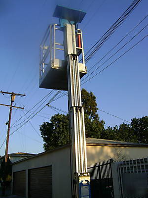 Genie gr-12 personnel scissor lift 2002