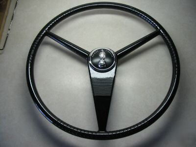 Case steering wheel & eagle on the globe emblem 
