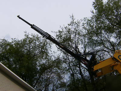 Skid steer tele boom T100