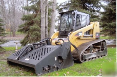 Skidsteer - cat landscape rake - harley rake-rockhound