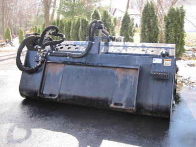 Skidsteer - cat landscape rake - harley rake-rockhound