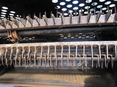 Skidsteer - cat landscape rake - harley rake-rockhound