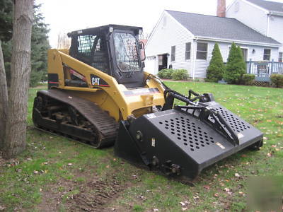 Skidsteer - cat landscape rake - harley rake-rockhound